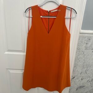 Alice and Olivia size 6 orange plunge neckline mini dress